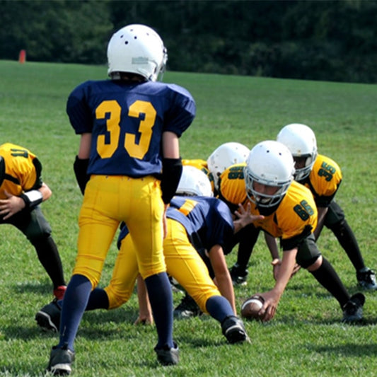 What are the advantages of using a custom sports team uniform designer?